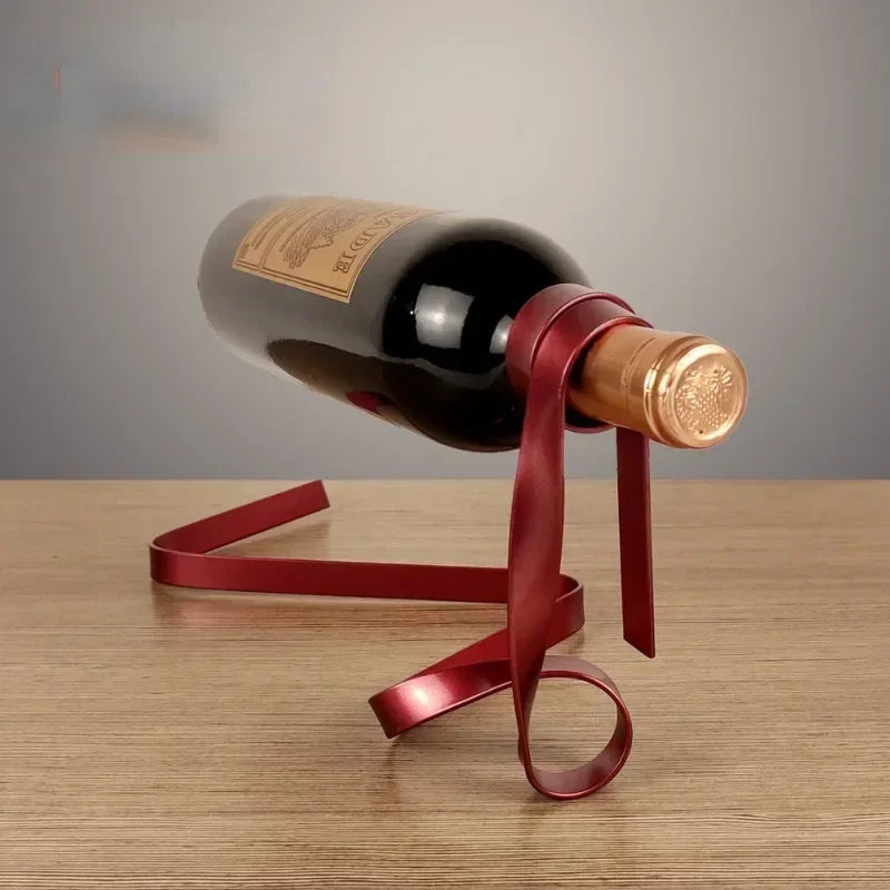 Support à vin flottant design en forme de ruban rouge satiné